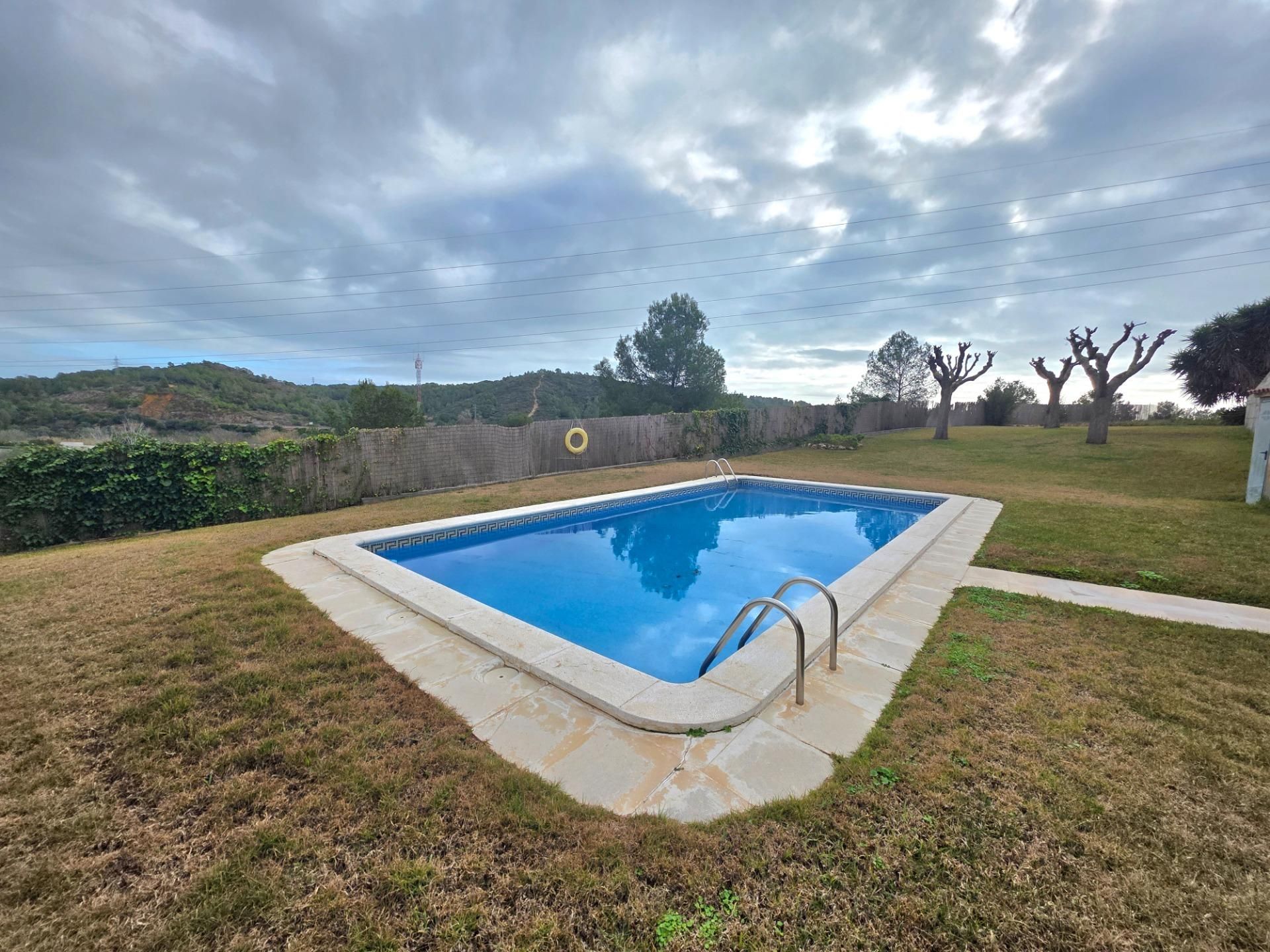 Swimming pool of Single-family semi-detached for sale in La Riera de Gaià  with Air Conditioner, Private garden and Terrace