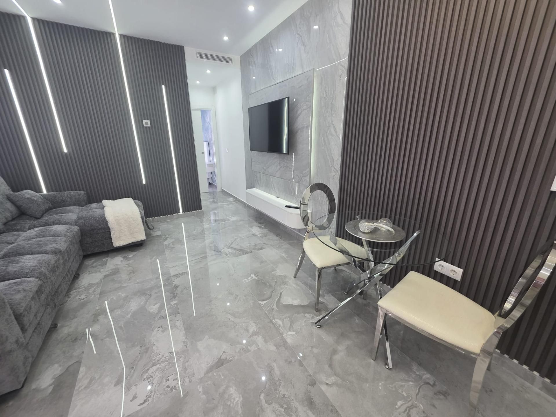 Sala de estar de Piso en venta en Benidorm con Aire acondicionado, Calefacción y Jardín privado