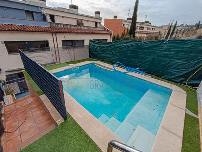 Swimming pool of Single-family semi-detached for sale in Granollers  with Air Conditioner, Terrace and Swimming Pool