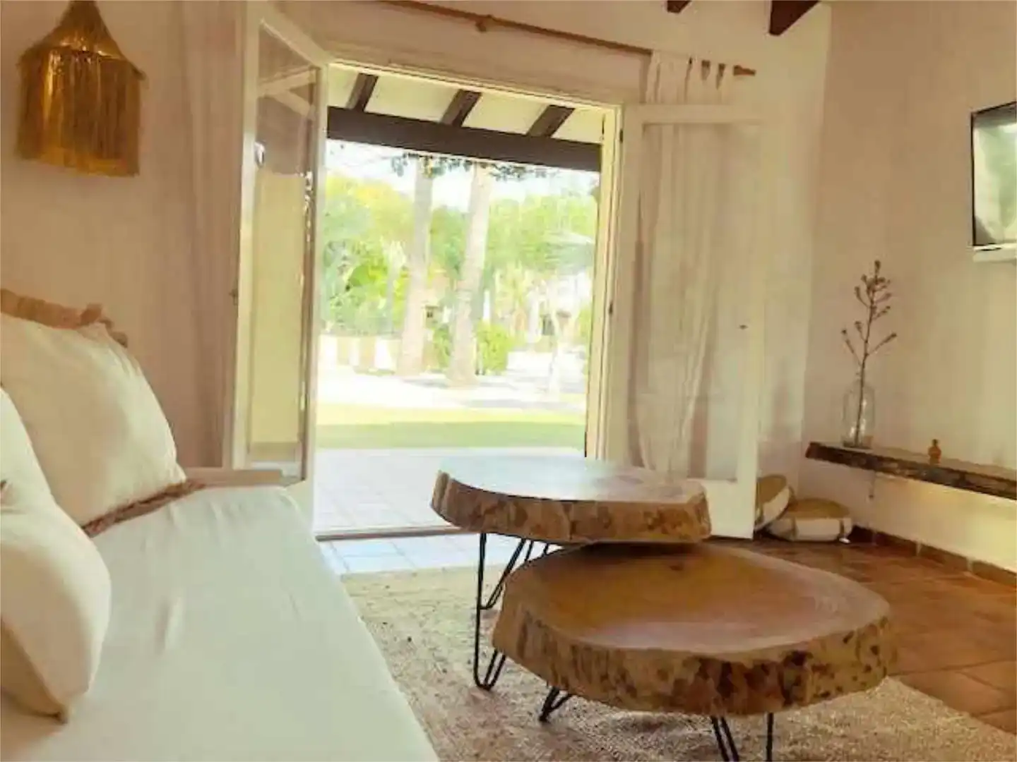 Sala d'estar de Casa adosada de lloguer en Ciutadella de Menorca amb Aire condicionat, Jardí privat i Piscina