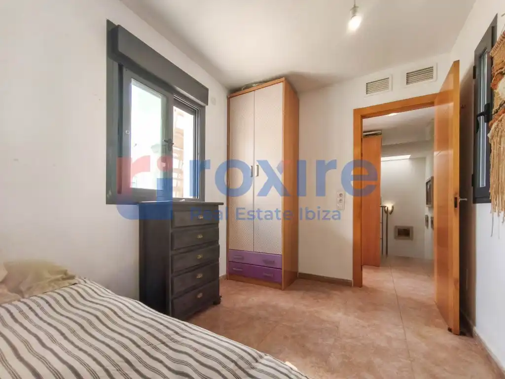 Dormitori de Casa adosada en venda en Sant Josep de sa Talaia amb Aire condicionat, Terrassa i Piscina