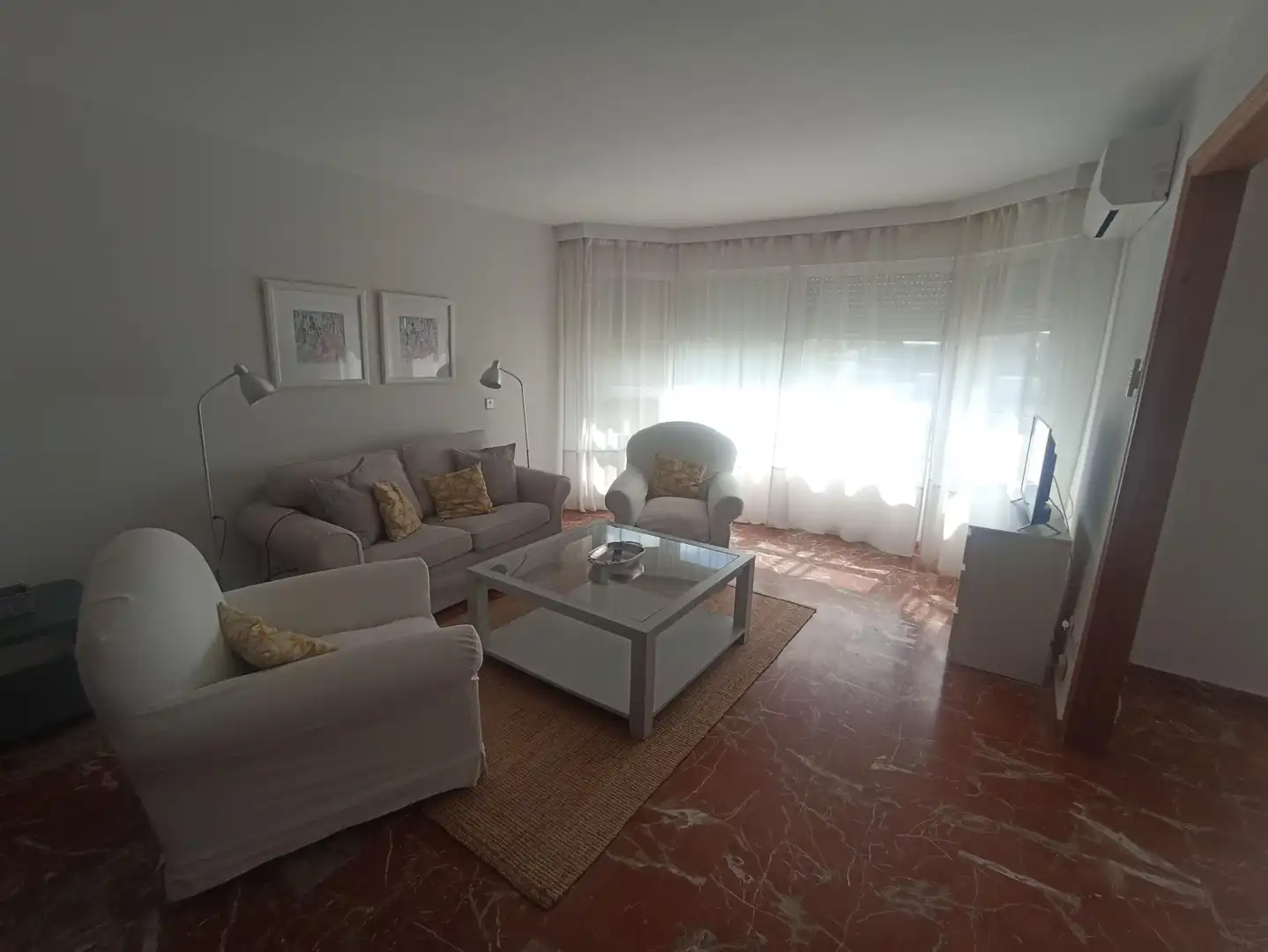Sala d'estar de Apartament de lloguer en Sevilla amb Aire condicionat, Terrassa i Moblat