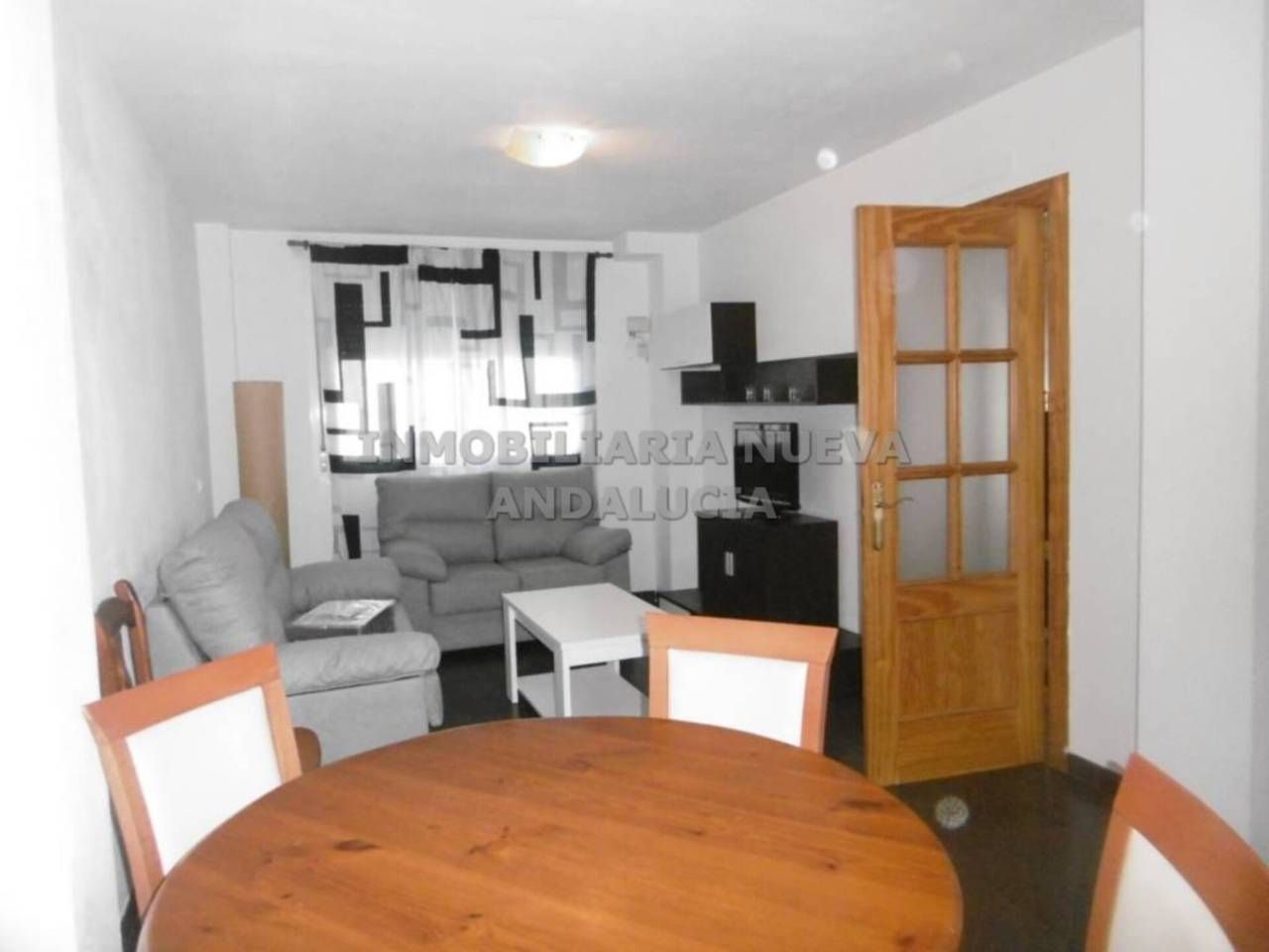 Sala d'estar de Casa adosada de lloguer en  Almería Capital amb Moblat