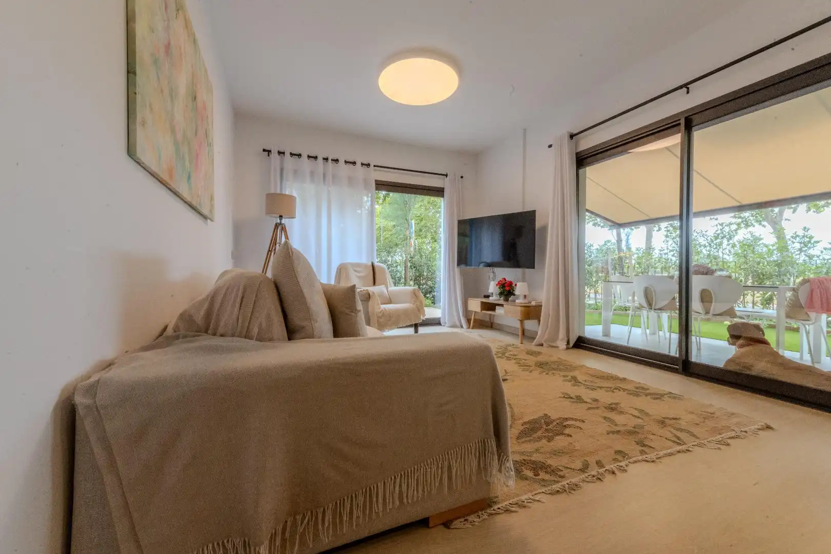 Sala d'estar de Planta baixa de lloguer en Castell d'Aro, Platja d'Aro i s'Agaró amb Aire condicionat, Calefacció i Jardí privat