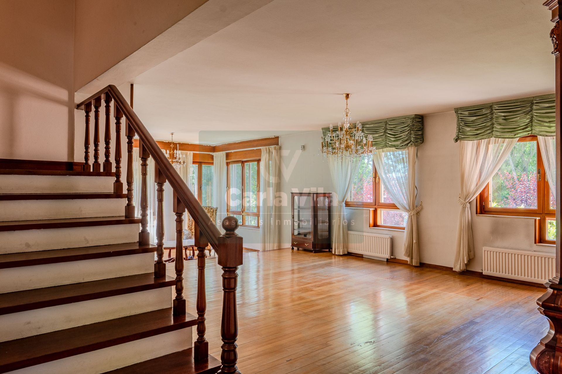 Sala de estar de Casa adosada en venta en Lugo Capital con Calefacción, Parquet y Terraza