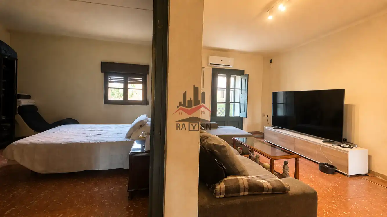 Sala d'estar de Casa adosada en venda en Riumors