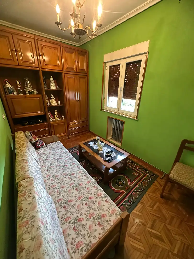 Sala de estar de Casa adosada en venta en San Martín del Rey Aurelio con Calefacción, Jardín privado y Terraza