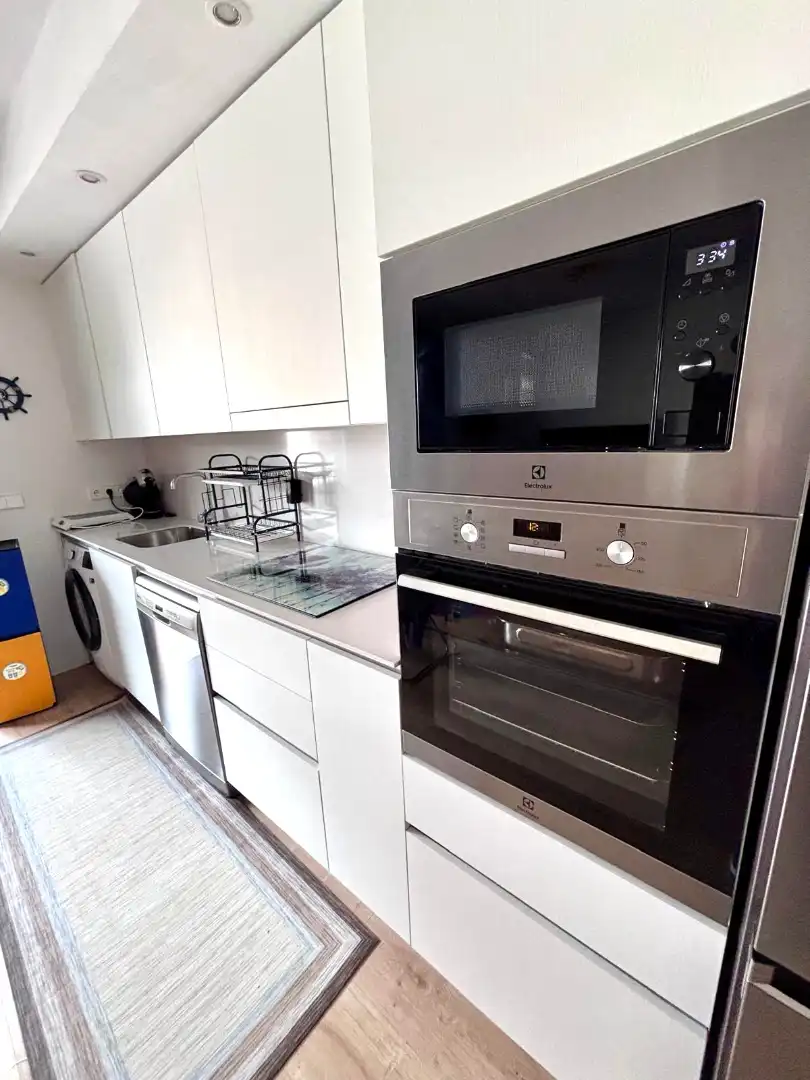 Kitchen of Flat for sale in Gijón   with Heating, Private garden and Parquet flooring