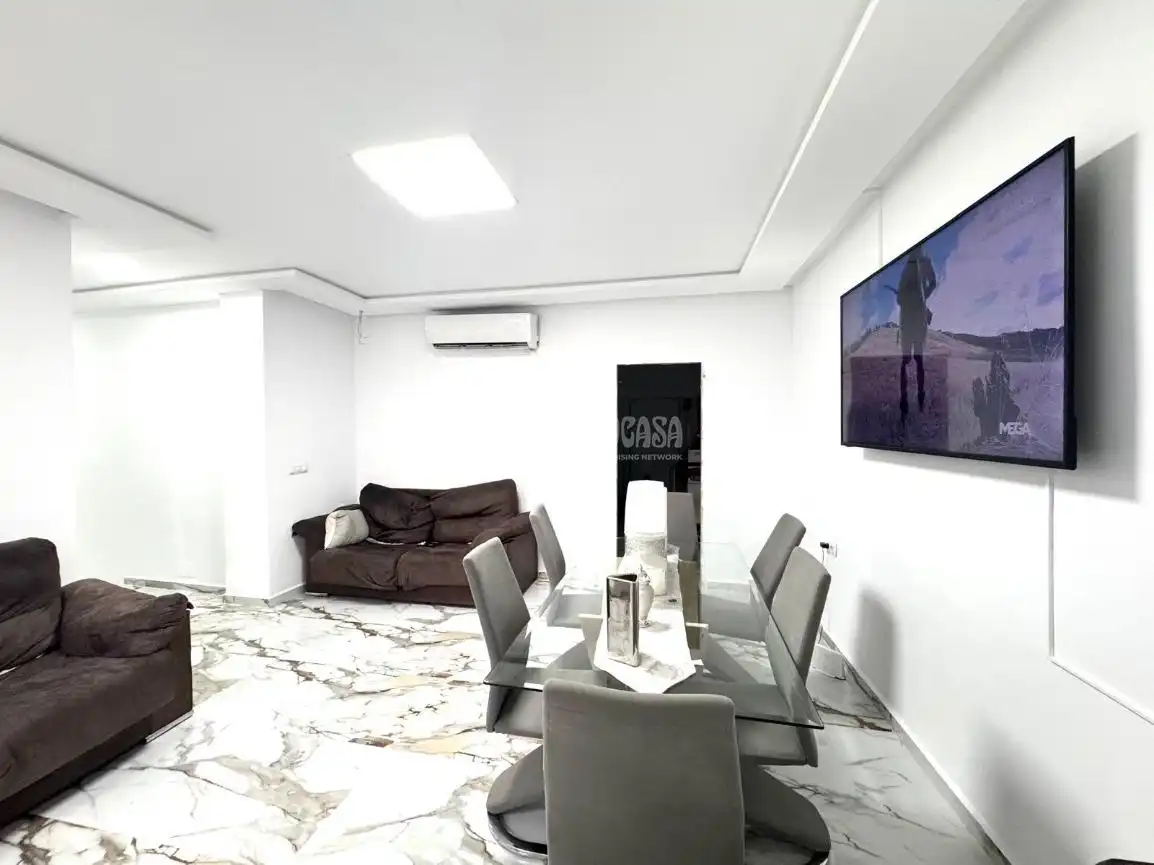 Sala d'estar de Casa adosada en venda en Almería amb Calefacció