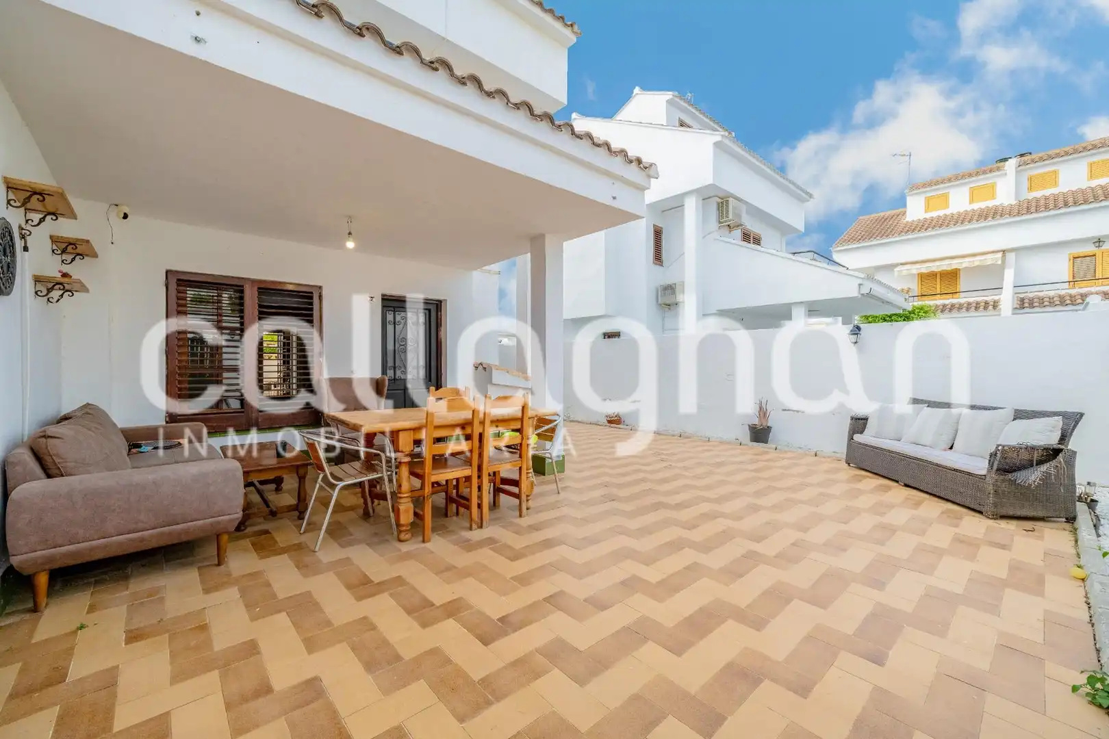Terrassa de Casa adosada en venda en Sagunto / Sagunt amb Aire condicionat, Calefacció i Jardí privat