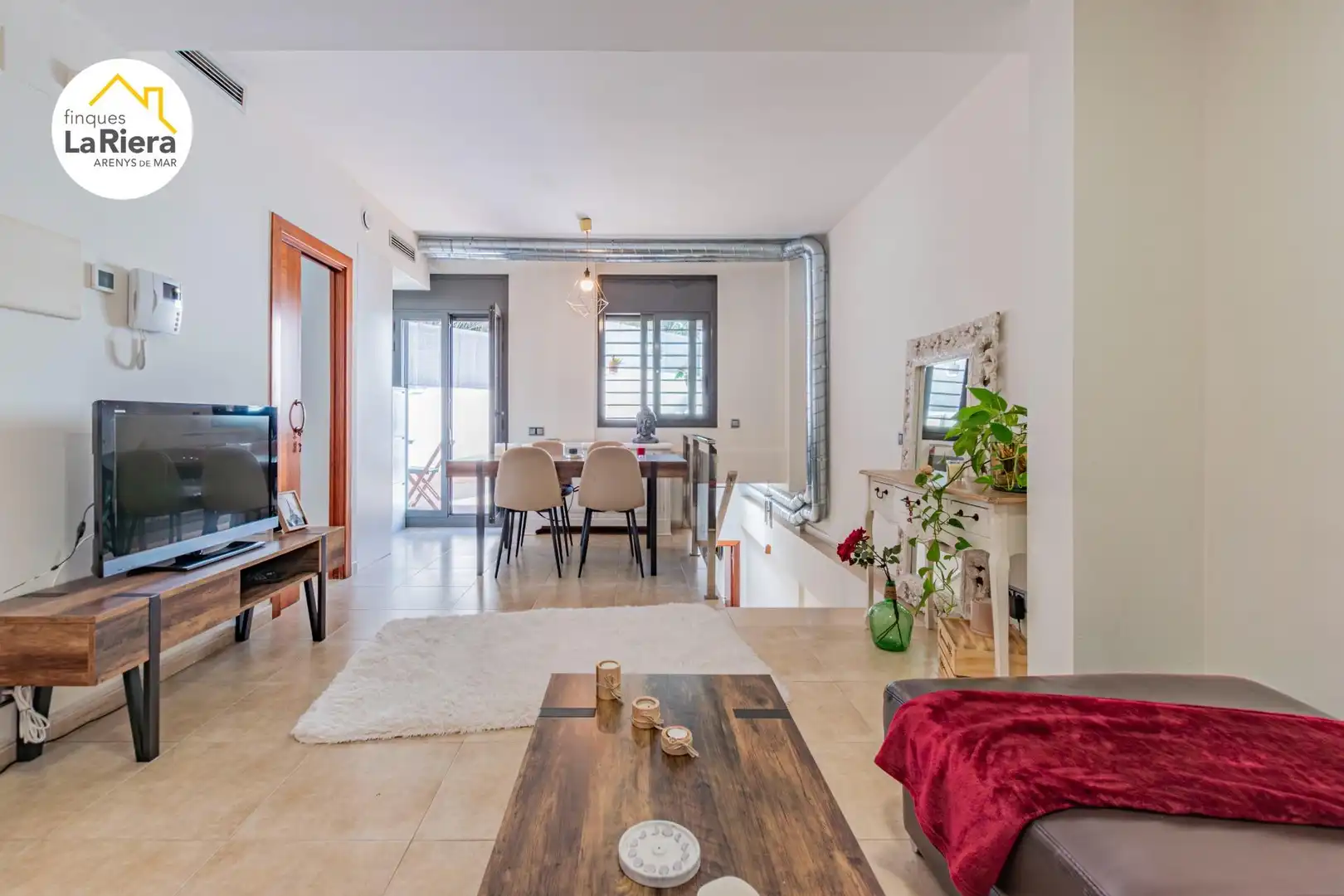 Sala d'estar de Dúplex en venda en Arenys de Mar amb Aire condicionat, Terrassa i Moblat