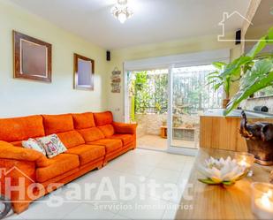 Living room of Planta baja for sale in Puçol  with Air Conditioner, Terrace and Balcony