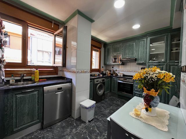 Kitchen of Flat for sale in Gijón   with Heating and Storage room