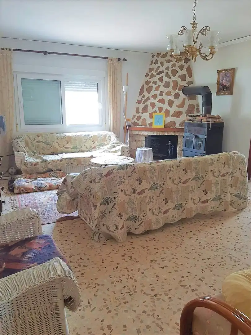 Sala d'estar de Casa o xalet en venda en Dénia amb Calefacció, Jardí privat i Piscina