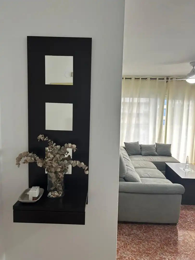 Sala d'estar de Pis de lloguer en La Pobla de Farnals amb Aire condicionat, Jardí privat i Terrassa