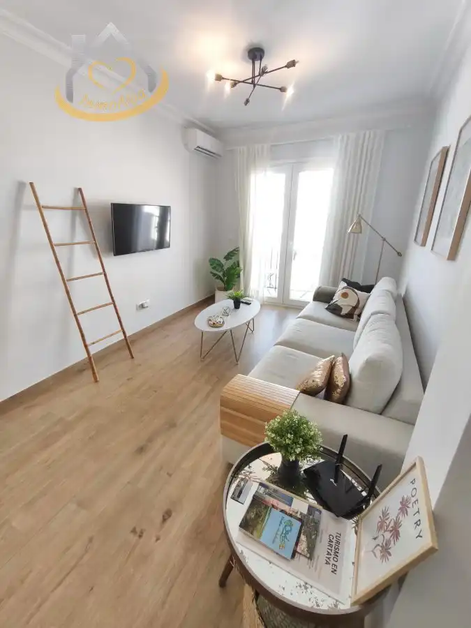 Sala de estar de Piso en venta en Cartaya con Aire acondicionado, Trastero y Amueblado