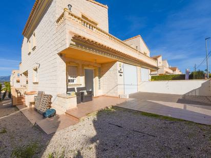 Exterior view of Single-family semi-detached for sale in L'Alfàs del Pi  with Air Conditioner, Private garden and Terrace