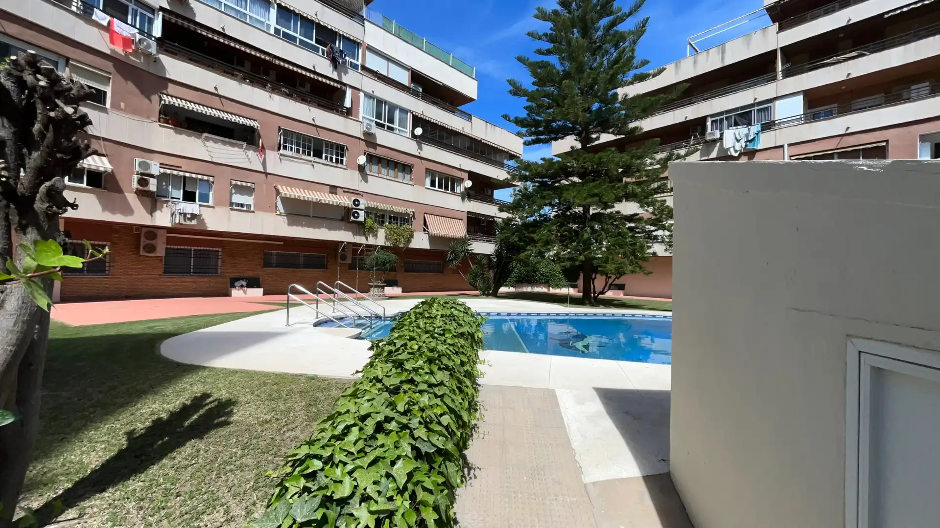 Swimming pool of Flat for sale in Málaga  with Air Conditioner, Furnished and Community pool