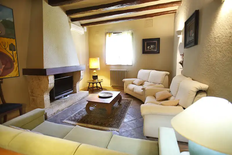 Sala de estar de Finca rústica en venta en Puigdàlber con Aire acondicionado, Calefacción y Jardín privado
