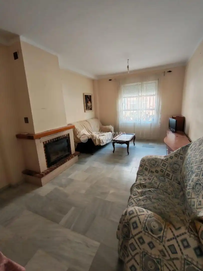 Sala de estar de Casa adosada en venta en Marchena