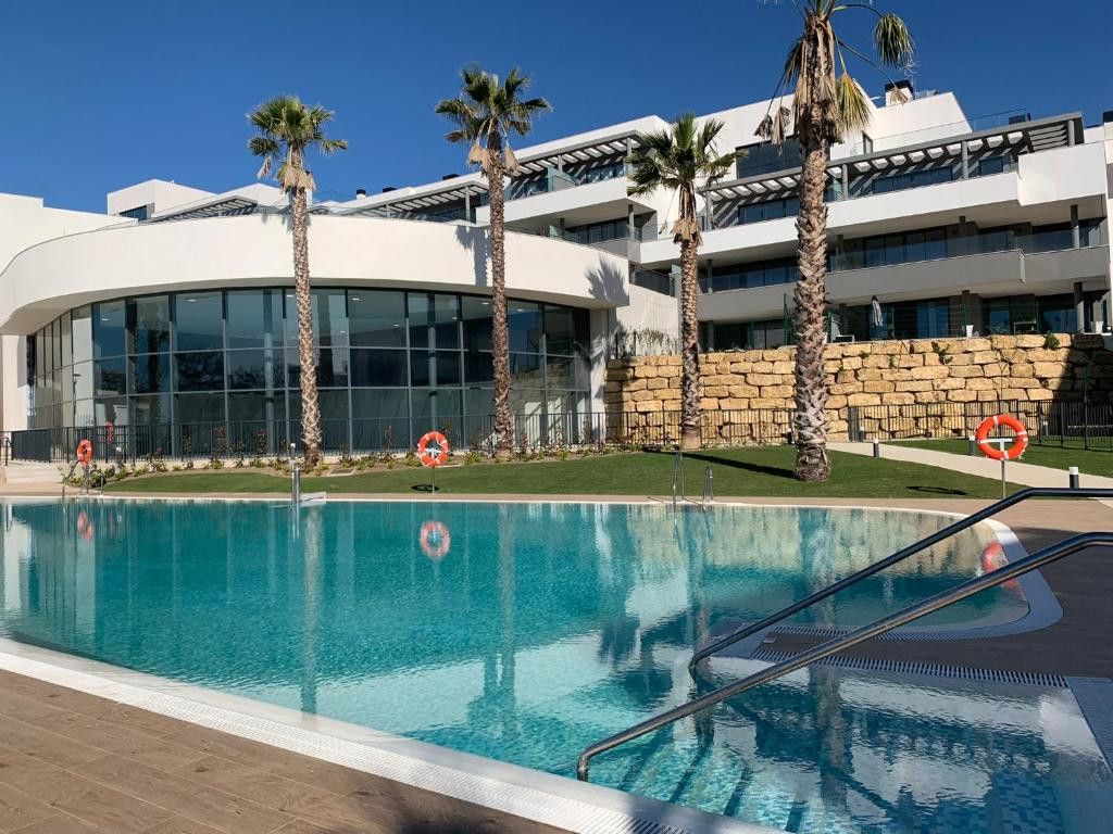 Piscina de Apartament de lloguer en Estepona amb Aire condicionat, Jardí privat i Terrassa