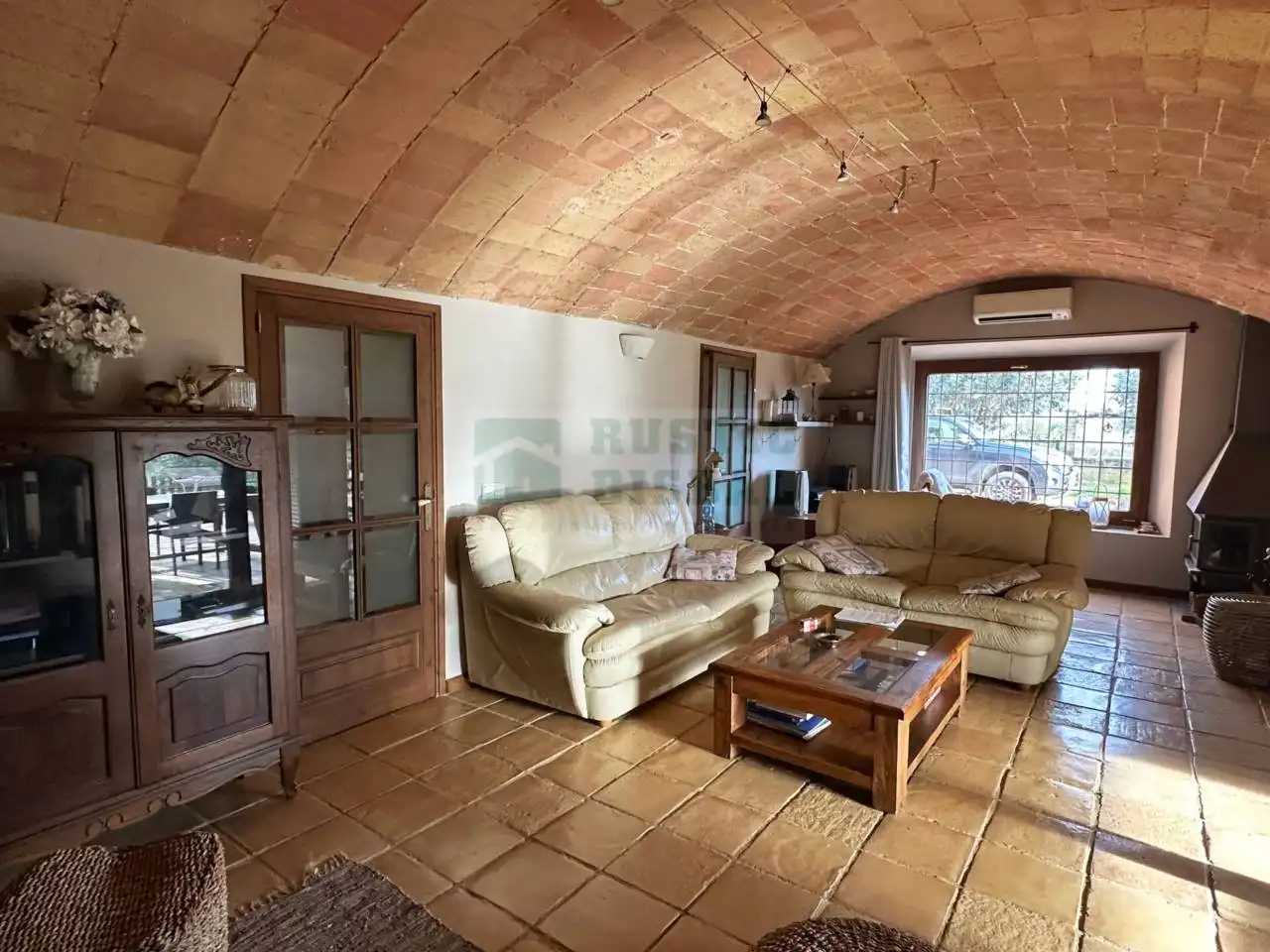 Sala de estar de Finca rústica en venta en Corçà con Aire acondicionado, Calefacción y Terraza
