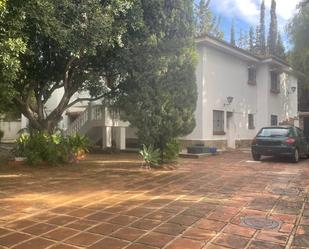 Exterior view of House or chalet for sale in Málaga Capital  with Private garden and Furnished