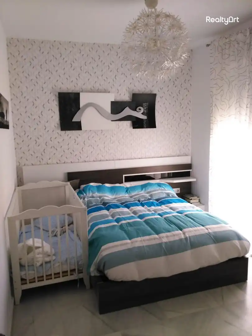 Habitación de Casa adosada en venta en Umbrete con Aire acondicionado, Calefacción y Jardín privado