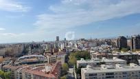 Exterior view of Attic for sale in  Madrid Capital  with Terrace, Storage room and Swimming Pool
