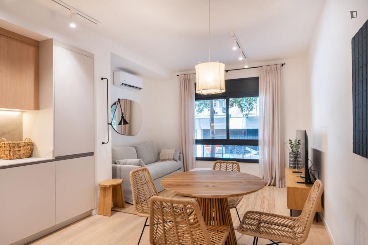 Sala d'estar de Apartament de lloguer en  Barcelona Capital amb Aire condicionat, Moblat i Rentadora