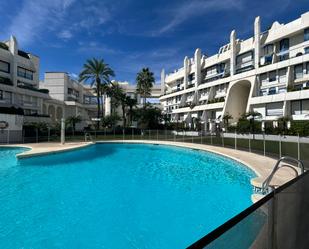 Swimming pool of Duplex for sale in Marbella  with Air Conditioner, Terrace and Balcony