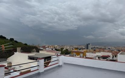 Exterior view of Single-family semi-detached for sale in Málaga Capital  with Terrace and Storage room
