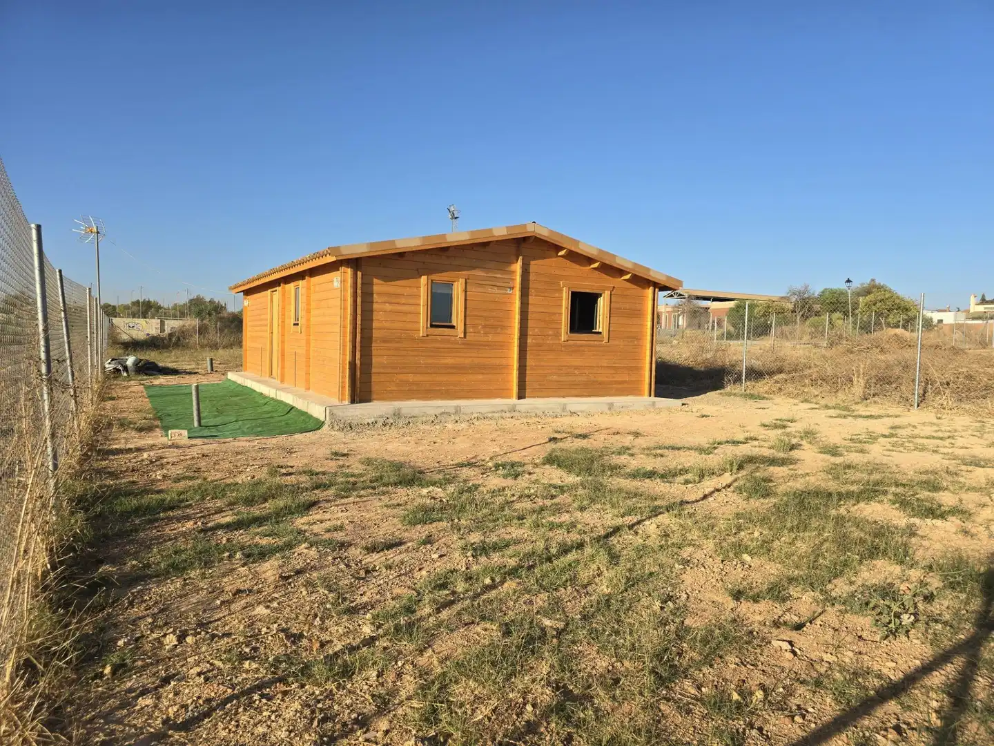 Vista exterior de Casa o chalet en venta en Palomares del Río con Jardín privado