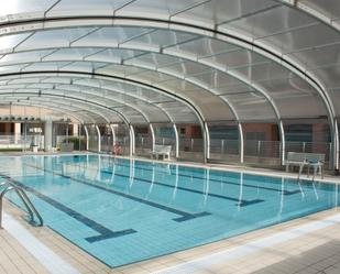 Swimming pool of Flat for sale in  Madrid Capital  with Air Conditioner, Heating and Storage room