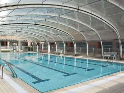 Swimming pool of Flat for sale in  Madrid Capital  with Air Conditioner, Heating and Storage room