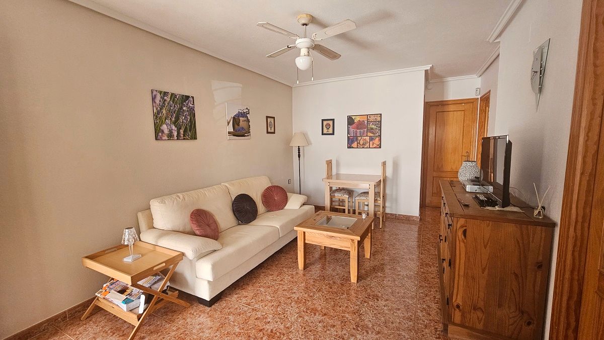 Sala d'estar de Apartament en venda en Santa Pola amb Aire condicionat, Terrassa i Traster