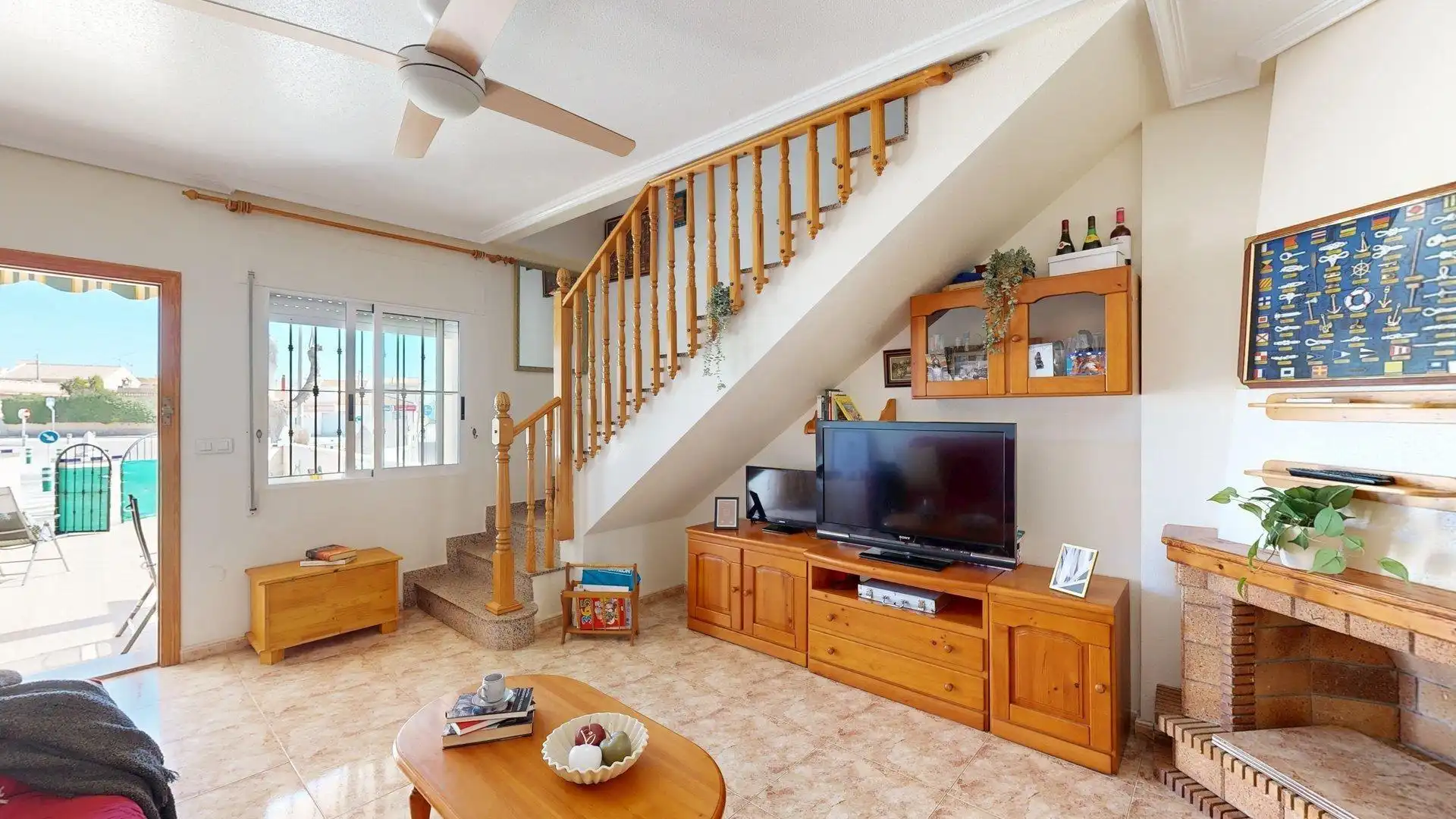 Sala de estar de Casa adosada en venta en Pilar de la Horadada con Jardín privado, Terraza y Balcón