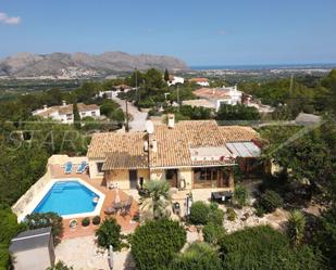 Vista exterior de Casa o xalet en venda en Benidoleig amb Aire condicionat, Terrassa i Traster