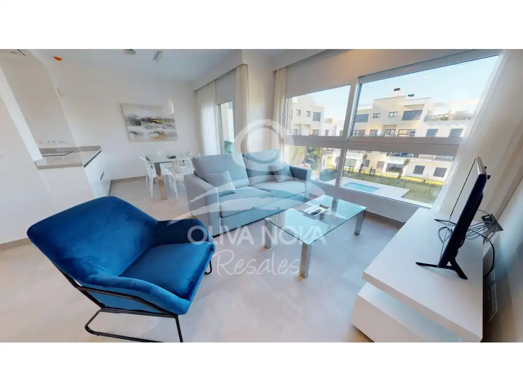 Sala d'estar de Apartament en venda en Oliva amb Aire condicionat, Jardí privat i Terrassa