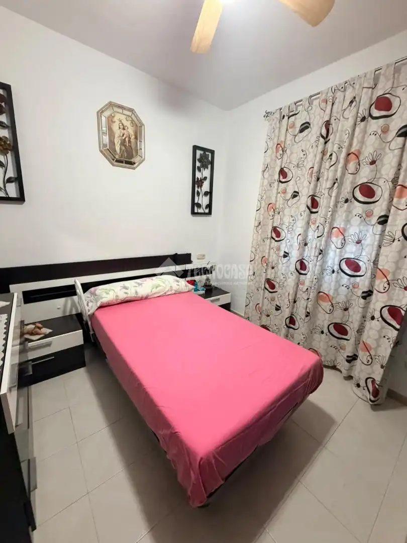 Habitación de Casa adosada en venta en Málaga