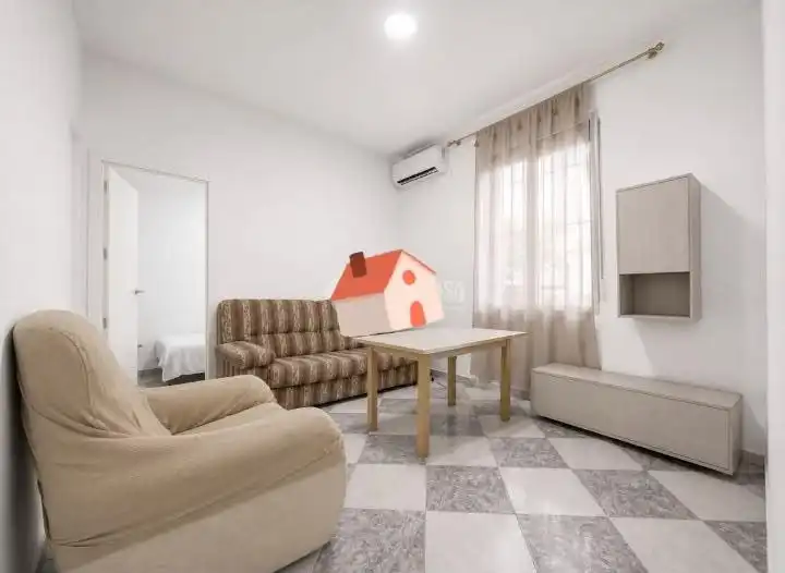 Sala d'estar de Planta baixa en venda en Sevilla amb Aire condicionat, Moblat i Forn