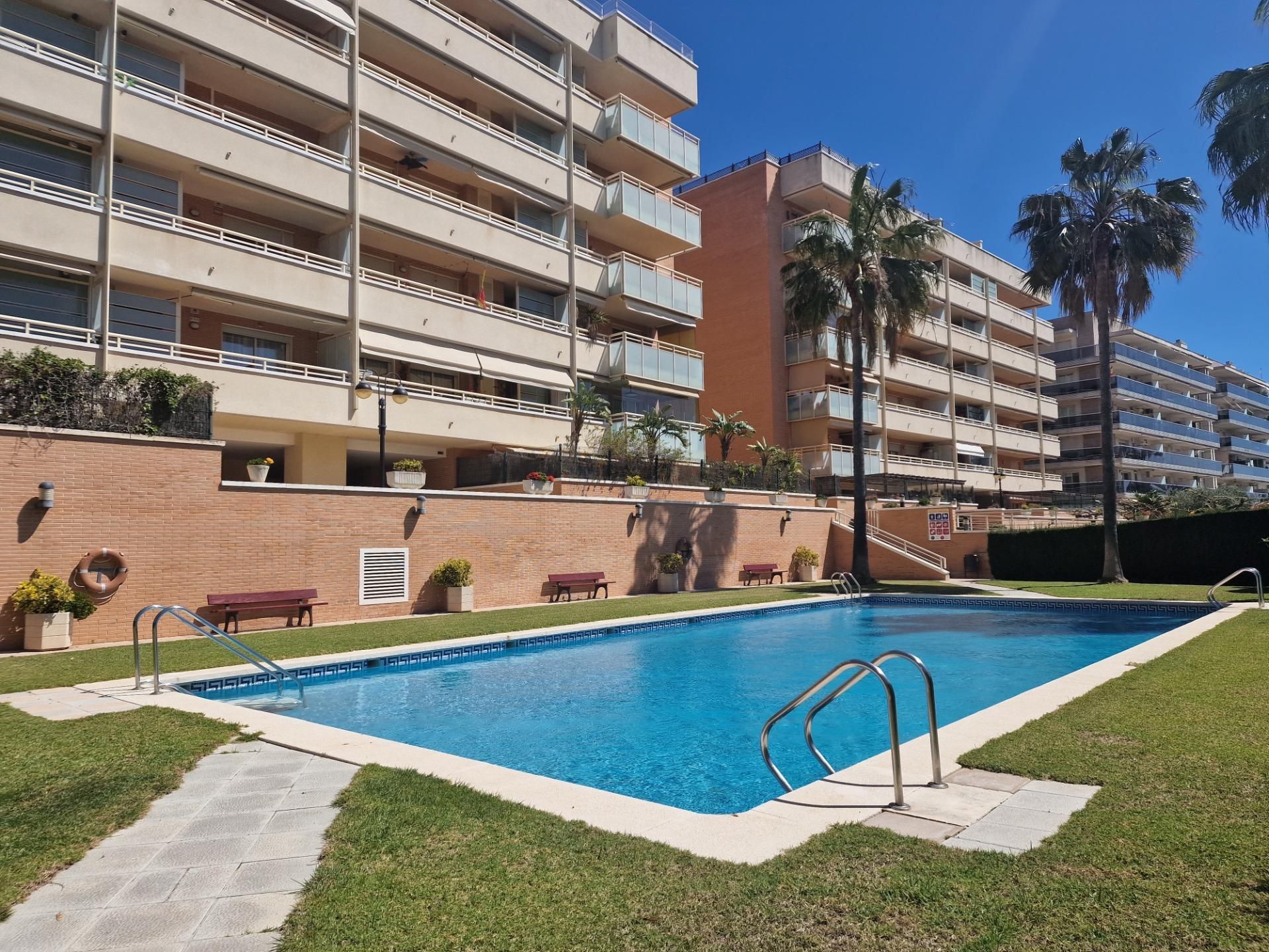 Swimming pool of Flat for sale in Salou  with Air Conditioner, Heating and Private garden