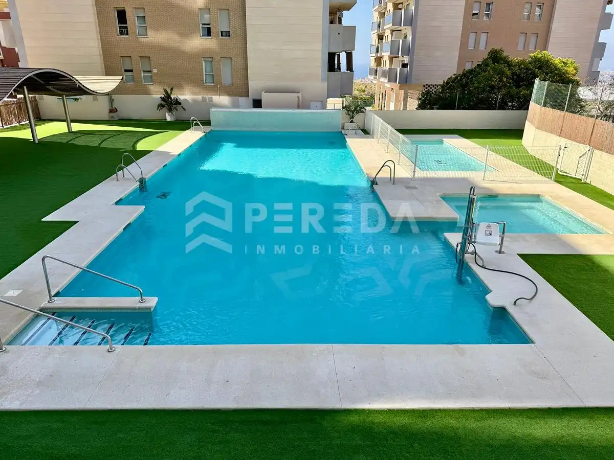 Swimming pool of Flat for sale in Roquetas de Mar  with Private garden, Terrace and Community pool