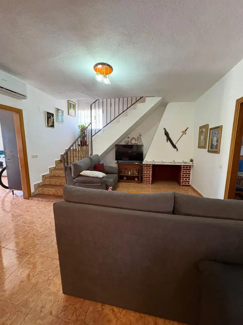 Sala de estar de Casa o chalet en venta en Castellón de la Plana / Castelló de la Plana con Jardín privado y Piscina comunitaria