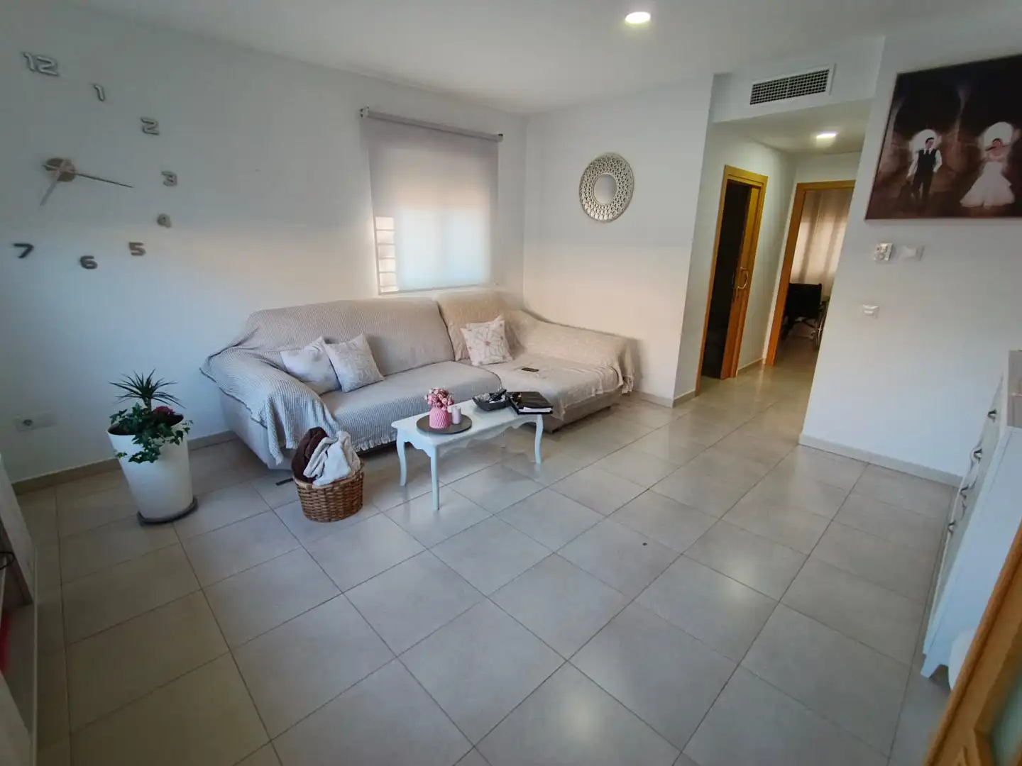 Sala d'estar de Casa adosada en venda en Mérida amb Moblat