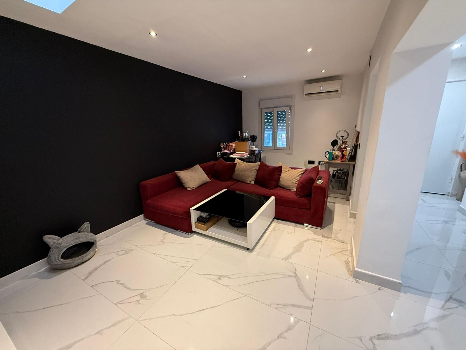 Sala de estar de Casa adosada en venta en  Almería Capital con Aire acondicionado y Jardín privado