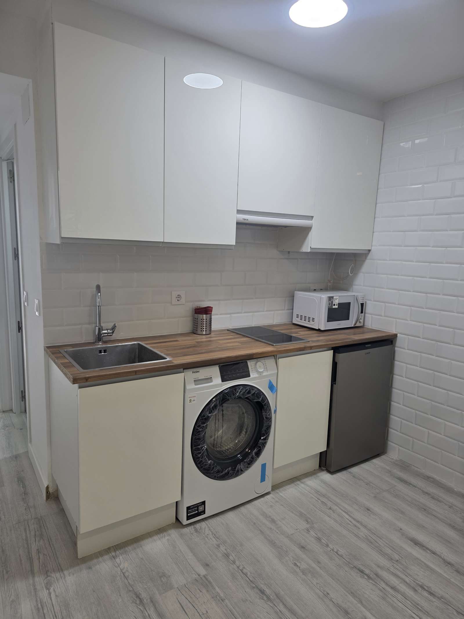 Cuina de Apartament per a compartir en  Madrid Capital amb Aire condicionat i Terrassa