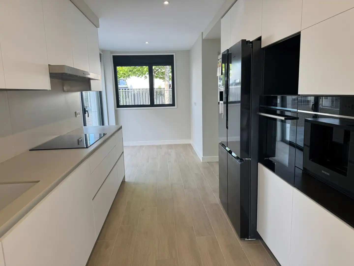 Cocina de Casa adosada en venta en Boadilla del Monte con Aire acondicionado, Calefacción y Jardín privado