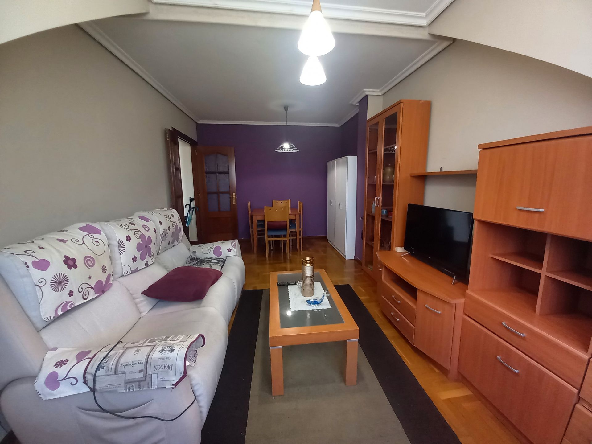 Sala d'estar de Apartament en venda en Castrillón amb Calefacció, Parquet i Traster