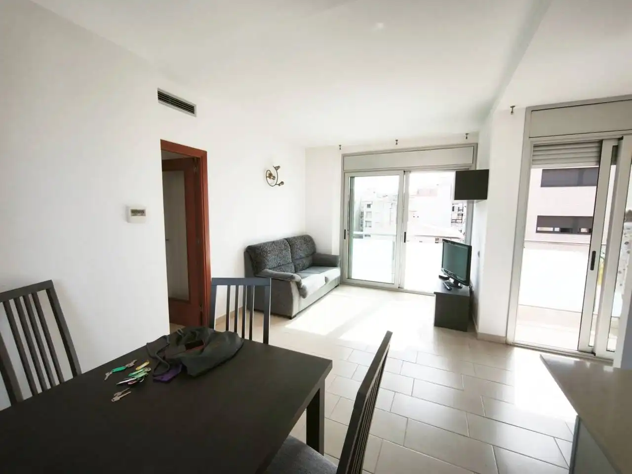 Wohnzimmer von Wohnung zum Verkauf in Calafell mit Klimaanlage, Heizung und Terrasse